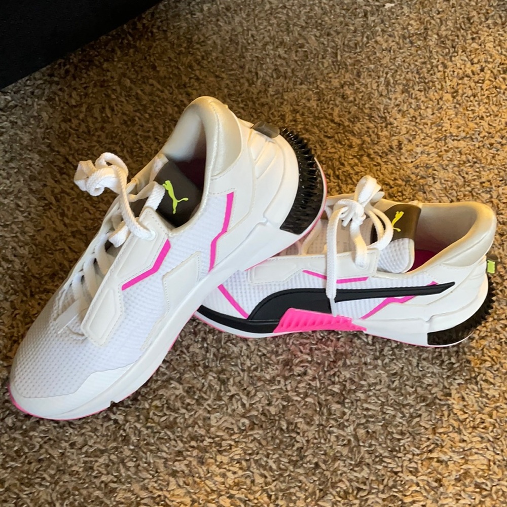 Black white and pink puma sneakers